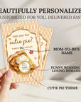 a hand holding a personalized pie-themed card.