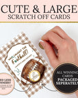 a hand holding a card with a football on it, along with text that says "CUTE & LARGE SCRATCH OFF CARDS".