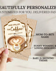 a hand holding a personalized coffee-themed baby shower card. The card has a coffee cup design and includes text that reads "Who spilled the coffee?" and "AMBER'S BABY SHOWER". The card also includes text that says "MOM-TO-BE'S NAME", "FUNNY WINNING & LOSING REMARKS", and "BABY IS BREWING THEME".