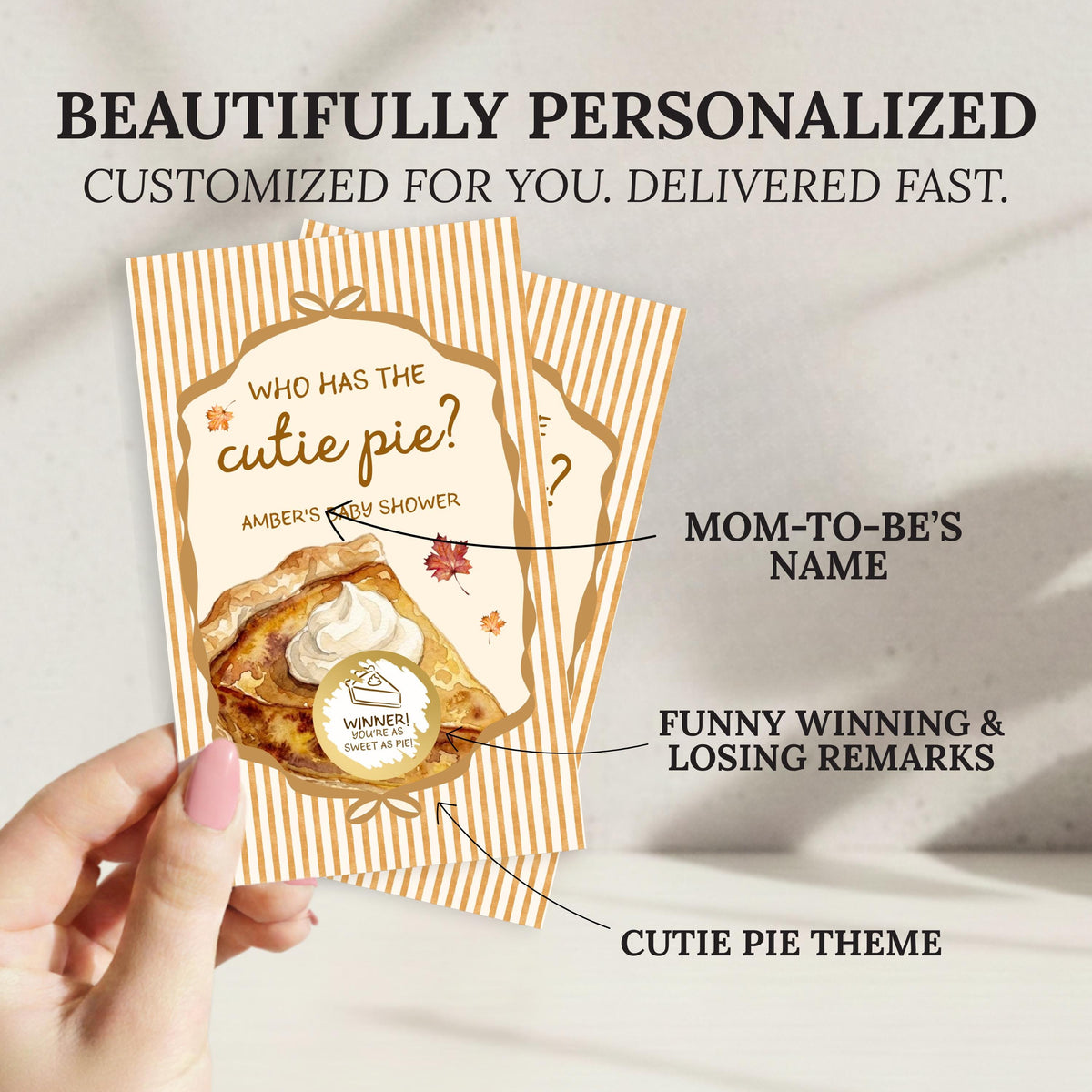a hand holding a personalized pie-themed card.